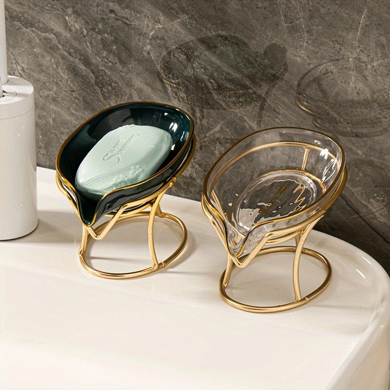 Two decorative soap holders on a bathroom counter with a soap bar.